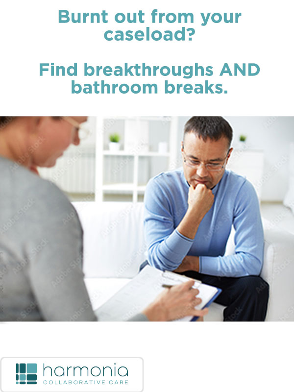 HarmoniaGrid woman with clipboard listening to man with glasses